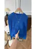 Suéter de punto hueco azul para hombre y mujer, nuevo estilo primavera y otoño, ajuste holgado casual, cuello redondo, suéter fino protector solar
