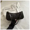Moda Estilo Coreano Viajero Retro Verano 2026 Nuevo Bolso Cruzado Color Sólido Casual Simple con Decoración de Hebilla de Cinturón Personalizada