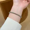 Nuevo producto transfronterizo: Pulsera de acero de titanio con cuentas redondas que no se decoloran, moderna y sencilla, pulsera con cierre chapado en oro de 18 quilates, joyería de lujo ligero
