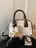 Bolsa de Ombro Shuai Mi para Axila 2026 Nova Moda Tendência Estilo Coreano Bolsa de Bowling Grande Capacidade Bolsa de Ombro