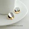 Pendientes metálicos de doble capa con diseño de bloqueo de color, estilo europeo y americano, para mujer, nuevo modelo 2026, diseño de nicho de lujo ligero con acabado brillante de alta gama