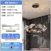 NEIWAI, un lujoso candelabro de cristal con intrincados diseños florales, perfecto para salas de estar, villas y salones principales, con un sofisticado diseño de anillo redondo y un marco metálico
