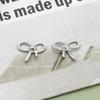 Sencillo lazo torcido dulce para niña metal de aleación DIY tocado pasador accesorios material para mayoreo