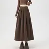 Saia midi plissada de veludo cotelê, moderna e versátil para mulheres, novo estilo outono e inverno 2026, saia midi plissada elegante com barra larga