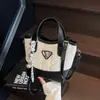 Bolso de cubo de mano de moda transfronterizo, nuevo estilo verano 2026, versátil y elegante, bolso de hombro y bandolera de alta gama de moda