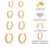 Europa y Estados Unidos transfronterizos súper ventas latón chapado en oro real pequeños exquisitos simples incrustados con circonita moda todo partido pendientes conjunto