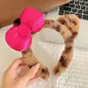 Faixa de cabeça de pelúcia divertida e peculiar para mulheres, com design de desenho animado, textura fofa e estilo de coroa alta, perfeita para lavar o rosto e adicionar um toque de sofisticação aos seus acessórios de cabelo.