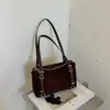 Bolsa de Almofada de Pelúcia Camurça de Alta Qualidade Feminina 2026 Nova Outono Super Quente Maillard para o Trabalho Ombro Único Sob o Braço