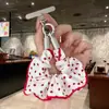 Alça de celular em tecido estilo doce e feminino com enfeites de strass, design criativo, atacado para chaveiros e pingentes de bolsa