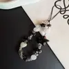 Cadena Negra para Teléfono Móvil Estilo Ins, Modelo Nuevo, Lanyard Divertido de Caramelo Estrella, Decoración de Cadena Ccd, Estilo Nuevo