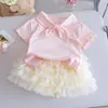 Conjunto Dulce para Niñas 25 Verano Nuevo Estilo Coreano Moda Celebridad de Internet Infantil Conjunto de Dos Piezas Elegante de Manga Corta y Falda Corta