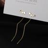Pendientes largos y pequeños de plata de ley con diseño de hada y agujeros para las orejas, con temperamento de mujer. Exquisitos pendientes con sentido del temperamento.
