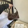 Bolso de mano pequeño para mujer para salir, tendencia de moda verano 2026, bolso de hombro de alta gama, bolso cruzado tipo albóndiga para el día a día