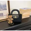 Bolso de mano de alta gama para comercio exterior, nuevo bolso cubo retro de nicho estilo coreano, elegante bolso de hombro, moderno bolso cruzado