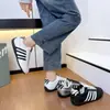 Zapatos de entrenamiento de cuero genuino 2026 otoño suela blanda no fatigantes blanco y negro para el trabajo y el trayecto zapatillas finas transpirables zapatos versátiles para mujer