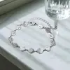 En stock Pulsera de Acero Inoxidable Sonrisa Fabricantes ins Nicho Chapado Joker Pareja Acero de Titanio Pulsera Sonriente