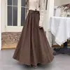 Nuevo falda midi de gamuza de cintura alta para mujer en color marrón Maillard, con un bajo amplio
