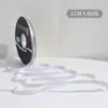 Lazo de regalo de color sólido de 1 cm flor decorativa para envolver material para ramos de cinta de satén venta al por mayor