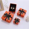 Nueva Caja de Empaque para Joyería con Moño de Letra Inglesa Cubierta Tiandi Collar Aretes Pulsera Caja de Empaque para Regalo de Vacaciones