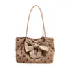 Bolso tote de lunares con lazo de estilo coreano a la moda para mujer, nueva colección otoño 2026, bolso de hombro de gran capacidad para el trabajo