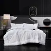 Calidad de hotel cinco estrellas, 100% algodón, impermeable, relleno de plumón, diseño a cuadros, edredón de invierno, engrosado, blanco puro, adecuado para casas de huéspedes