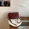 Bolso de mujer de gran capacidad transfronterizo, nuevo modelo primavera 2026, bolso de hombro para debajo del brazo, juego madre-hija, bolso pequeño cuadrado para trabajo y uso diario de mujer