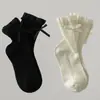 Calcetines para niños para otoño e invierno con bordes rizados y lazos, adecuados para niñas y bebés, estilo Lolita, calcetines de media pantorrilla sin presión