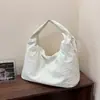 Bolsa de Ombro Única Versátil de Grande Capacidade para o Dia a Dia de Mulheres Bolsa Tote de Lona Casual da Moda 2026 Novo Estilo Preguiçoso Bolsa de Axila