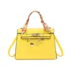 Bolso de mujer de nicho de alta gama 2026 nuevo de primavera vintage versátil bandolera bolso de mano versátil casual bolso tipo Kelly