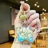 Llavero Creativo Serie Océano Relleno de Aceite Pez Payaso Estrella de Mar Pez Pequeño Colgante de Bolso Decoración de Llavero