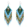 Pendientes de Borla Larga Coloridos con Flores de Luna de Cuentas de Arroz Hechos a Mano de Venta Caliente Transfronteriza Gancho de Oreja Bohemio Europeo y Americano para Mujeres
