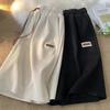 Pantalones cortos de seda de hielo para hombre, ropa exterior de verano, deportivos, informales, elásticos, de color liso, estilo holgado, combinables, para el hogar, de longitud media.