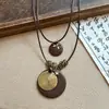 Collar Casual de Cuerda Trenzada con Cuentas de Corazón Largo para Mujer 2025 Nuevo Estilo Étnico Retro Diseño de Nicho Cadena para Suéter