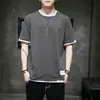 Camiseta de manga corta para hombre casual de media manga verano juvenil top holgado para hombre Nueva moda ins marca verano manga corta hombre