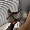 Bolso de Axila para Mujer 2026 Nuevo de Moda Principios de Otoño Popular Casual para el Trabajo Bolso de Hombro Cruzado de Moda Versátil Bolso Cubo