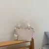 Bolso Cubo Estilo Coreano de Nicho para Mujer Verano 2026 Nuevo Bolso de Mano de Moda Bolso Cruzado para el Trabajo y el Trayecto Bolso de Hombro Simple