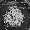 Joyería para uñas popular en línea japonesa al por mayor versátil redonda tridimensional perla brillante diy accesorios mixtos para uñas