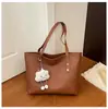 Bolso de mano de diseño vintage de alta gama y nicho para mujer, nuevo bolso de moda para hombro cruzado otoño e invierno 2026