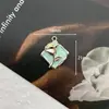 Nova gota de cor acessórios de liga de óleo temperamento joias rosa alto senso acessórios de cabelo brincos colar chaveiro pingente