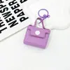Bolsa de chaveiro portátil colorida, bolsa de fone de ouvido, porta-moedas, pingente de chaveiro, porta-cartão para itens pequenos, pingente de bolsa de armazenamento