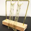 Versión Coreana de Ins Estilo de Lujo Ligero Estilo Celebridad Ruili Mismo Estilo Pendientes de Borla Acero de Titanio Chapado en Cobre Pendientes de Oro Real de 18K