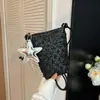 Bolso versátil de diseño de nicho transfronterizo para el día a día, nuevo bolso tejido para teléfono móvil 2026, bolso de hombro/cruzado moderno y sencillo