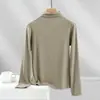 Camiseta de manga larga básica ajustada para mujer que realza la figura, de canalé, color liso, cuello alto, top fino versátil para primavera y otoño