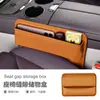 Caja de Almacenamiento para Hueco de Asiento de Coche Transfronteriza Portavasos Interior Suministros Bolsa para Coche Bolsa de Almacenamiento Caja de Almacenamiento Multifuncional