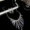 Aretes y collar de dos piezas con colgante de flor y gota de agua incrustados con diamantes, cadena para la clavícula de moda y exquisita, joyería de lujo ligero y de alta gama para mujer