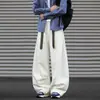 Pantalones de mujer de estilo americano de alta gama, plisados, corte curvo, nuevos pantalones de pierna ancha para la primavera 2026, pantalones casuales sueltos y con caída.