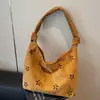 Bolsas Modernas e Versáteis para Mulheres Outono e Inverno 2025 Nova Tendência Nicho High-End Bolsa de Ombro para o Dia a Dia Bolsa Tote de Grande Capacidade