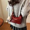 Bolso de nicho para mujer, novedad de otoño e invierno de 2025, popular bolso de hombro de alta gama, bolso cruzado tipo bola de masa.