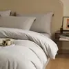 Juego de ropa de cama de cuatro piezas de algodón cepillado de color sólido estilo minimalista, funda de edredón de algodón puro, sábana, juego de ropa de cama de tres piezas para dormitorio