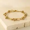 Pulseira Cuban Hemp Flower de Aço Inoxidável Simples e de Alta Qualidade para Homens e Mulheres, Versátil Estilo Ins Pulseira de Aço Titânio Dourado 18K